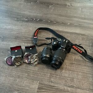 Pentax K-x with two lenses